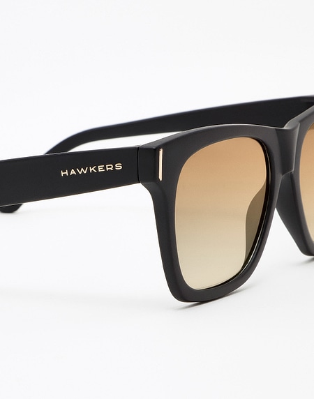 Nos Lunettes de Soleil Hawkers CARBON BLACK - GOLD SUNSET