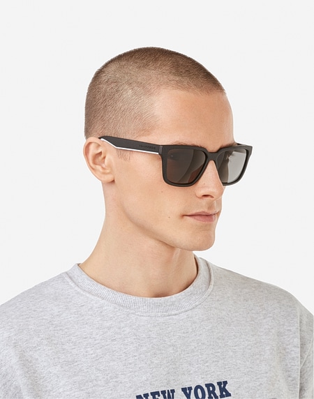 Lentes de sol Hawkers MOTION - POLARIZED BLACK DARK