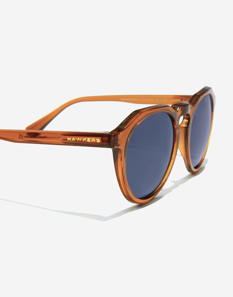 Nos Lunettes de Soleil Hawkers WARWICK RAW - CARAMEL DARK BLUE