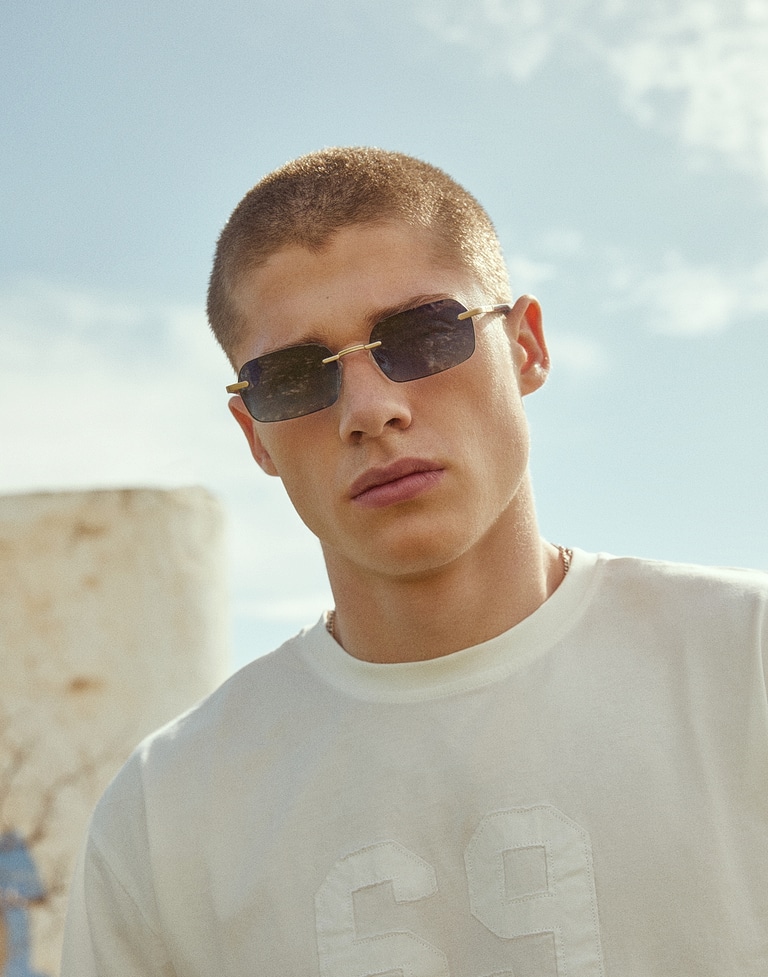 Nos Lunettes de Soleil HAWKERS ENIGMA - LIGHT GOLD BLUE TO GREEN
