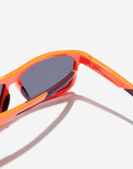 Lentes de sol Hawkers COMANECI - POLARIZED ORANGE PURPLE