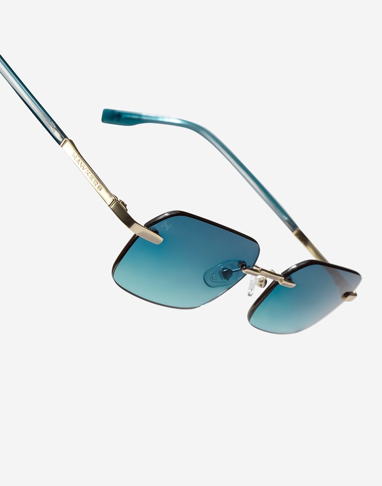 Nos Lunettes de Soleil HAWKERS ENIGMA - LIGHT GOLD BLUE TO GREEN