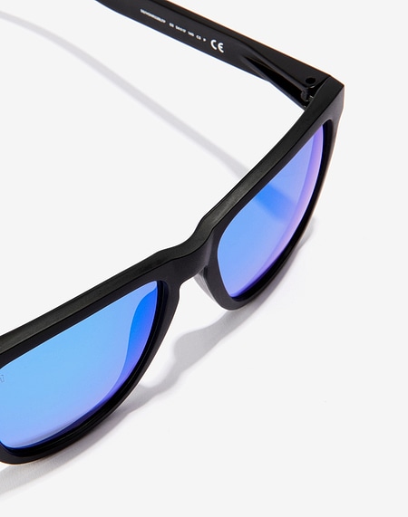 Lentes de sol Hawkers ONE RAW - POLARIZED BLACK CLEAR BLUE