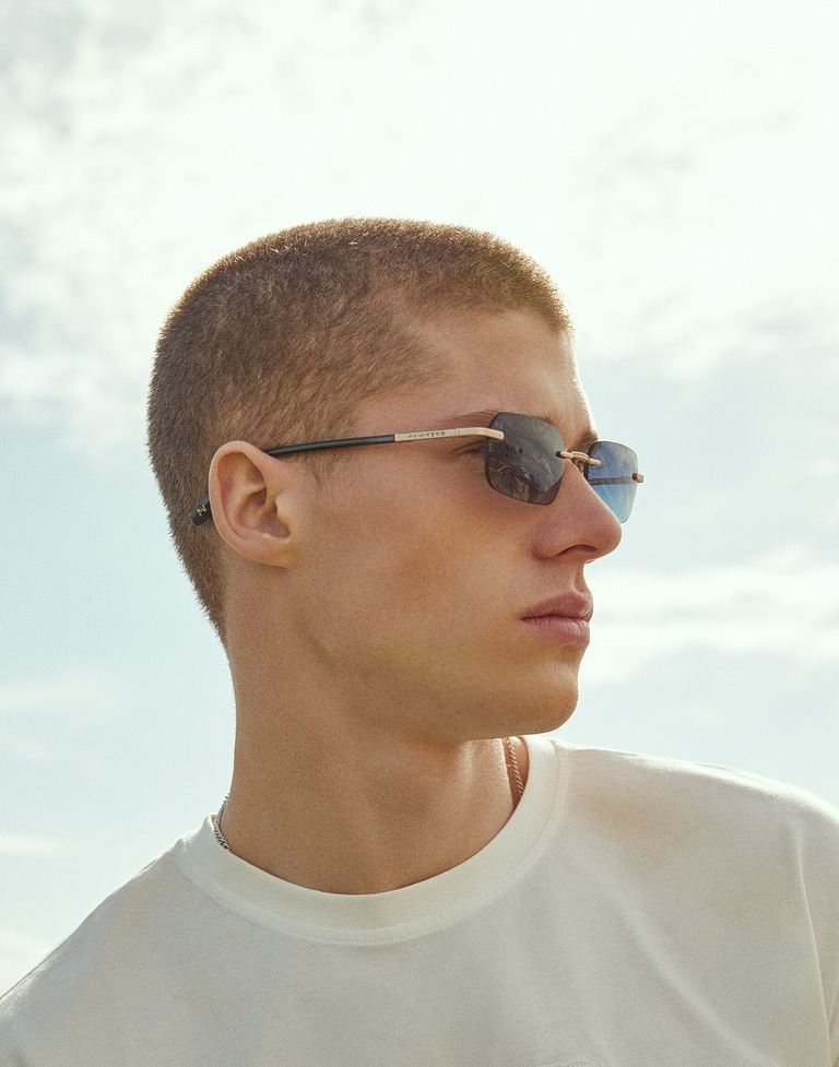 Nos Lunettes de Soleil HAWKERS ENIGMA - LIGHT GOLD BLUE TO GREEN