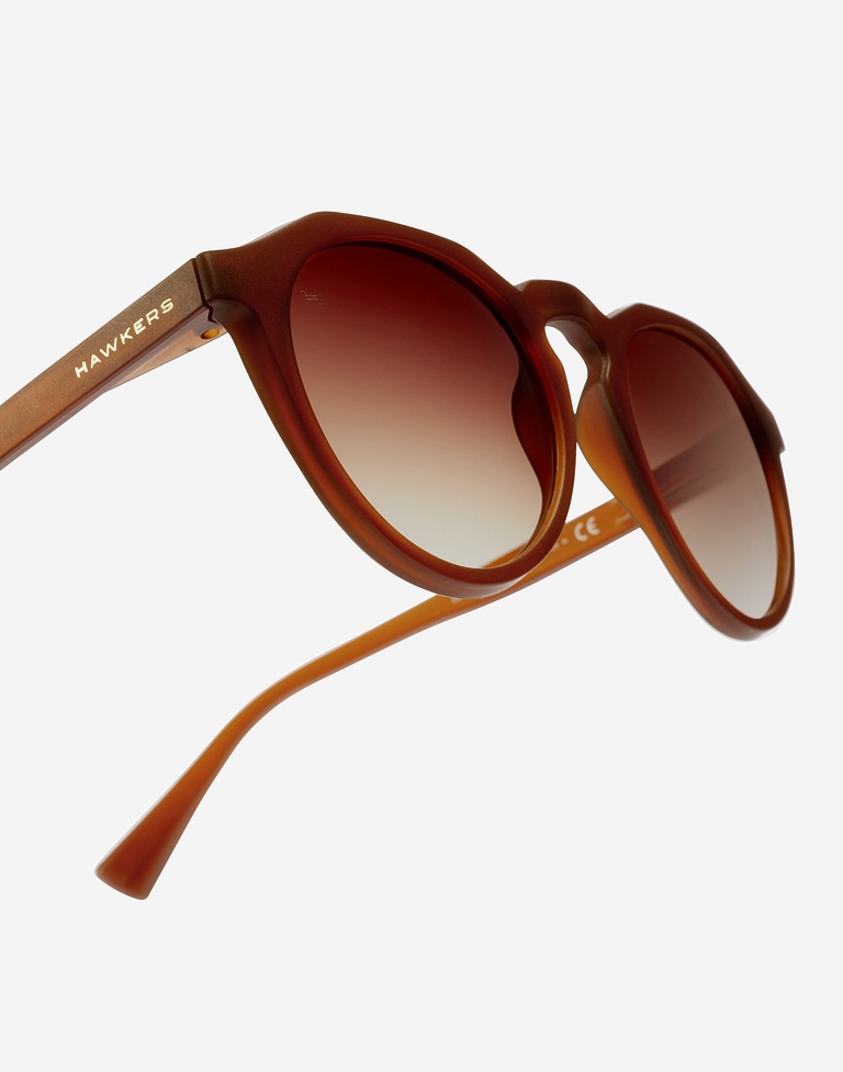 Nos Lunettes de Soleil Hawkers WARWICK RAW  - CARAMEL TERRACOTTA