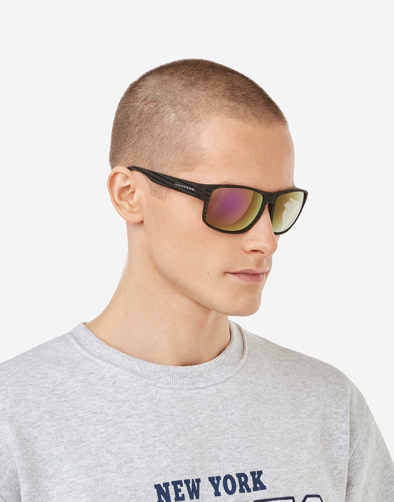 Sonnenbrille Hawkers FASTER RAW CARBON FIBER - BLACK JOKER