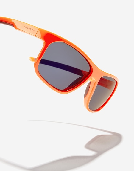 Lentes de sol Hawkers COMANECI - POLARIZED ORANGE PURPLE