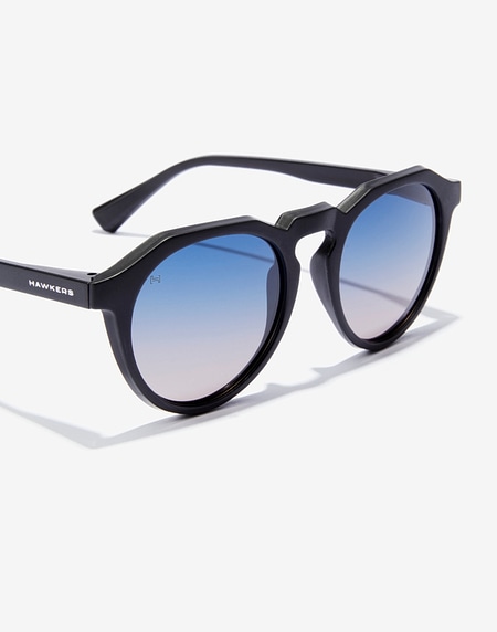 Lentes de sol Hawkers WARWICK RAW - BLACK BLUE TO PEACH
