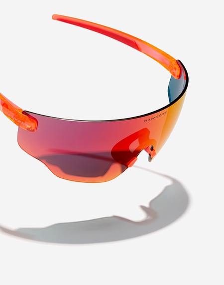 Sonnenbrille Hawkers SPEED - FLUOR ORANGE RUBY